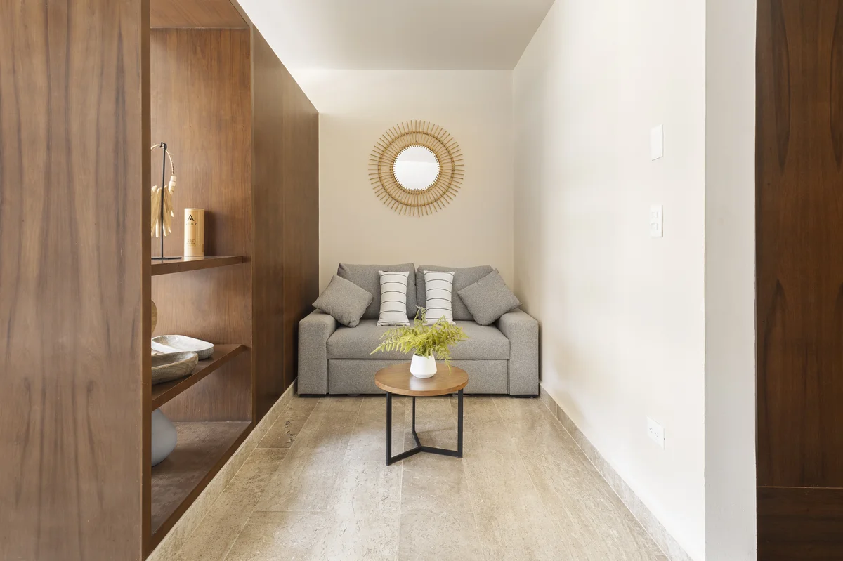 View of Compact Living Area at Peregrina, showcasing Sofa Bed, Modern Interior Design.