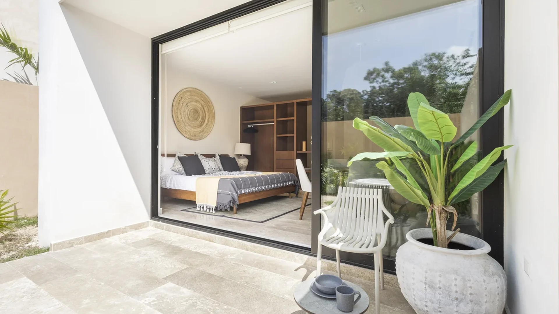View of Bedroom at Peregrina, showcasing Private Patio, Indoor Outdoor Living.