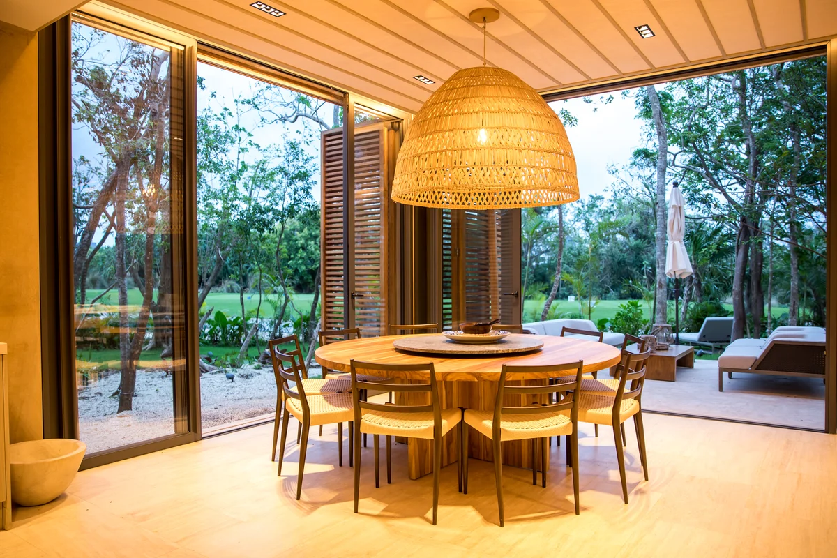 Image of Lounge at Palm Villas, featuring Modern Dining Room, Indoor-Outdoor Living.
