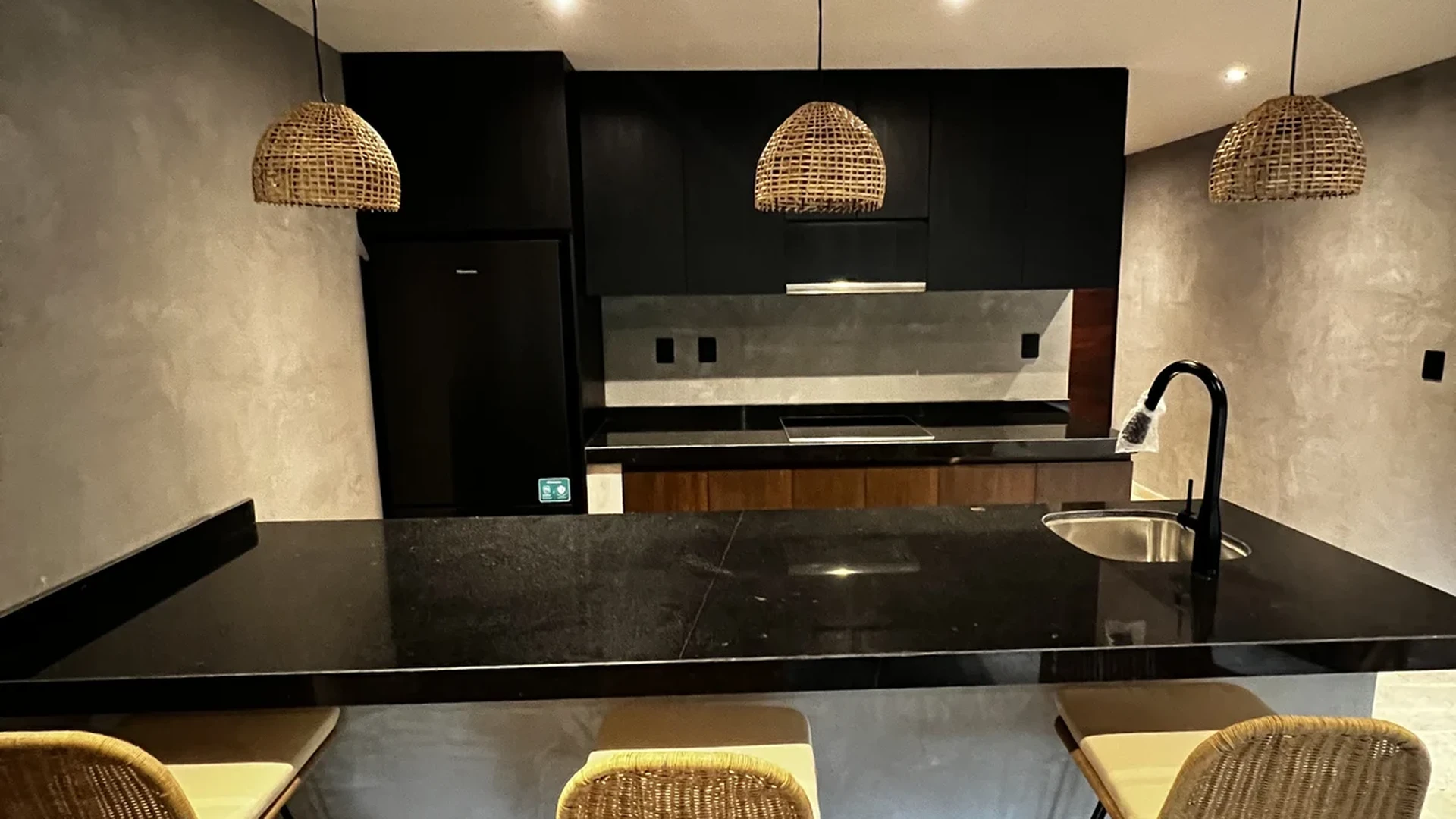 View of Modern Kitchen at Punta Playa, showcasing Kitchen Island, Breakfast Bar.