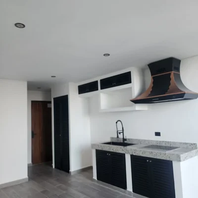 View of Modern Kitchen at Serenata, showcasing Kitchenette, Granite Countertop.