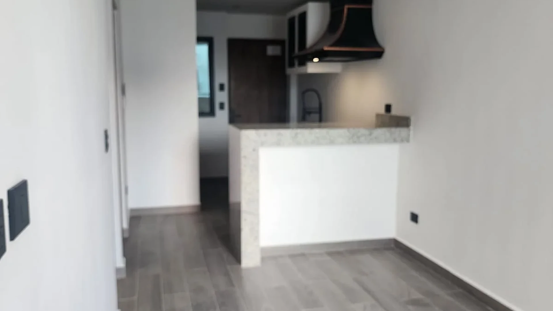 View of Modern Kitchen at Serenata, showcasing Open Concept Living, Tile Flooring.