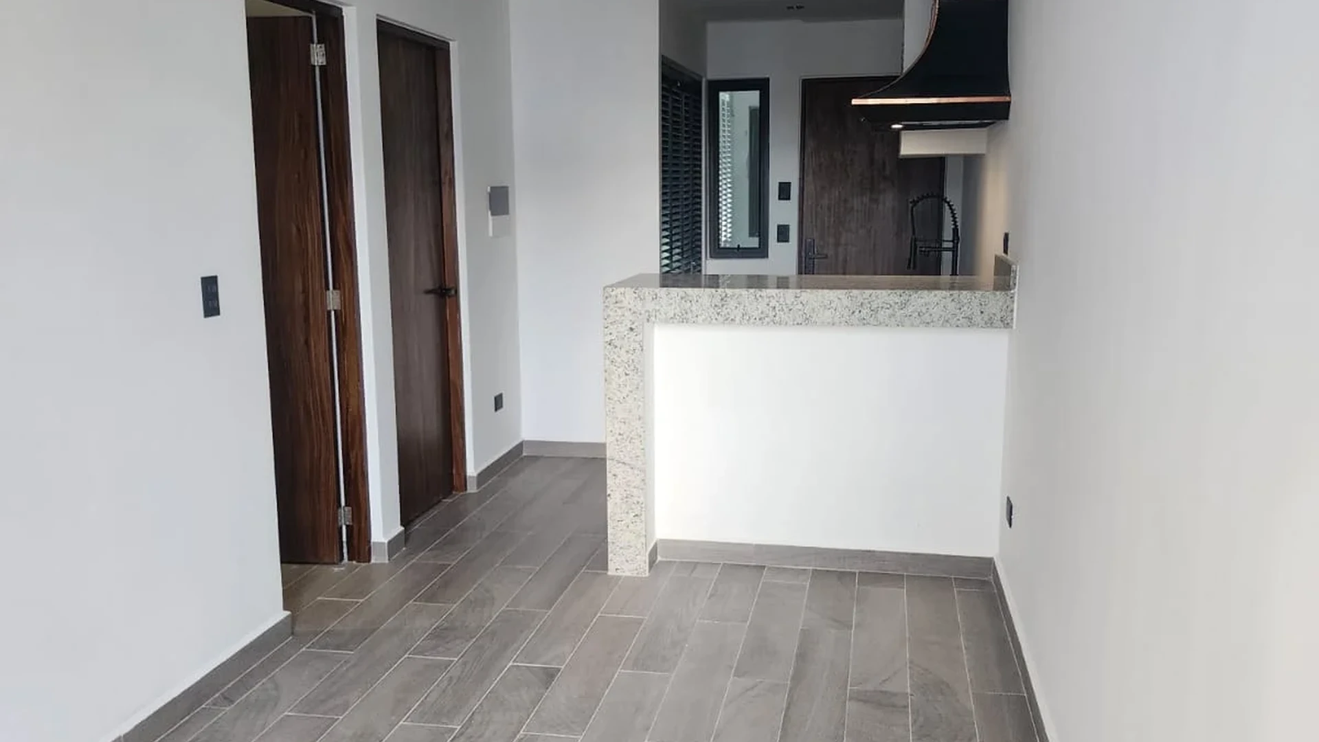 View of Modern Interior at Serenata, showcasing Open Concept Kitchen, Contemporary Design.