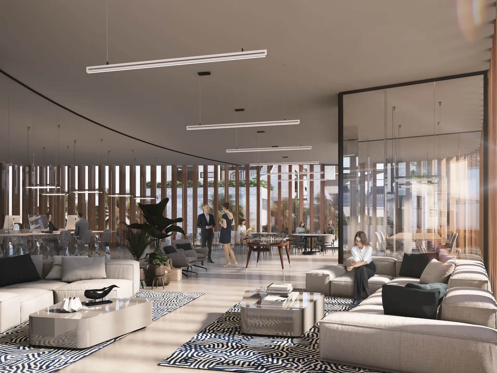 Modern co-working space with lounge seating and workstations.