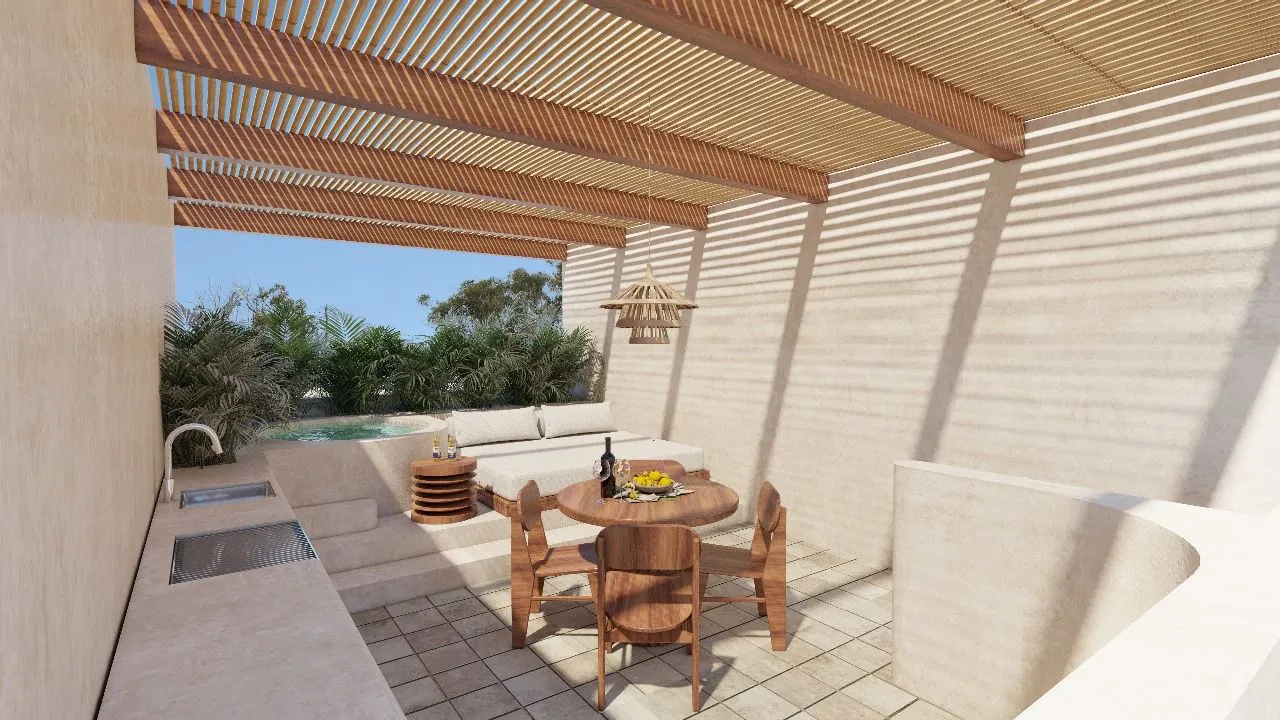 Covered outdoor patio with dining set and kitchenette