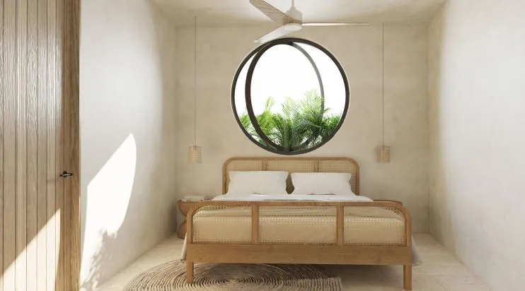 Bedroom with circular window and wooden bed