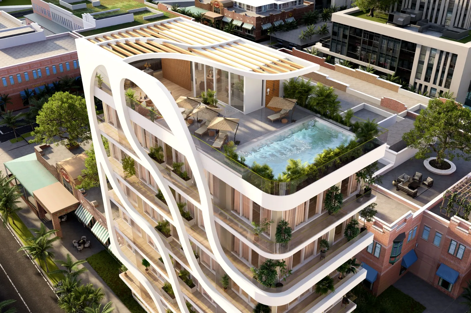 Aerial view of modern building with rooftop pool and lounge.