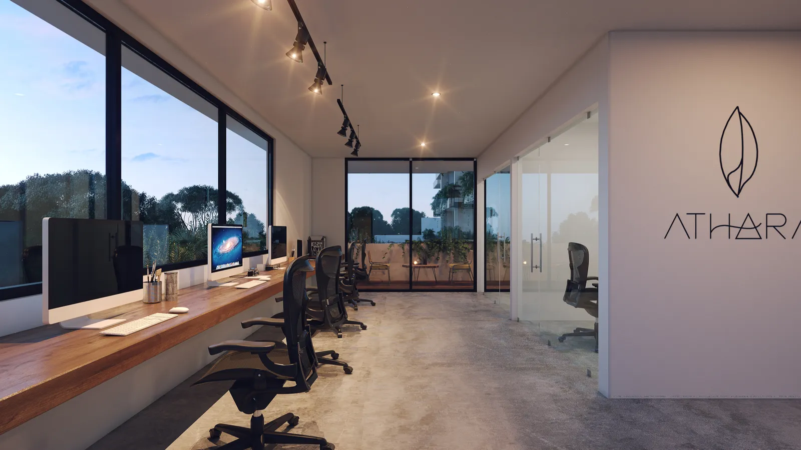 Modern co-working space with workstations and large windows