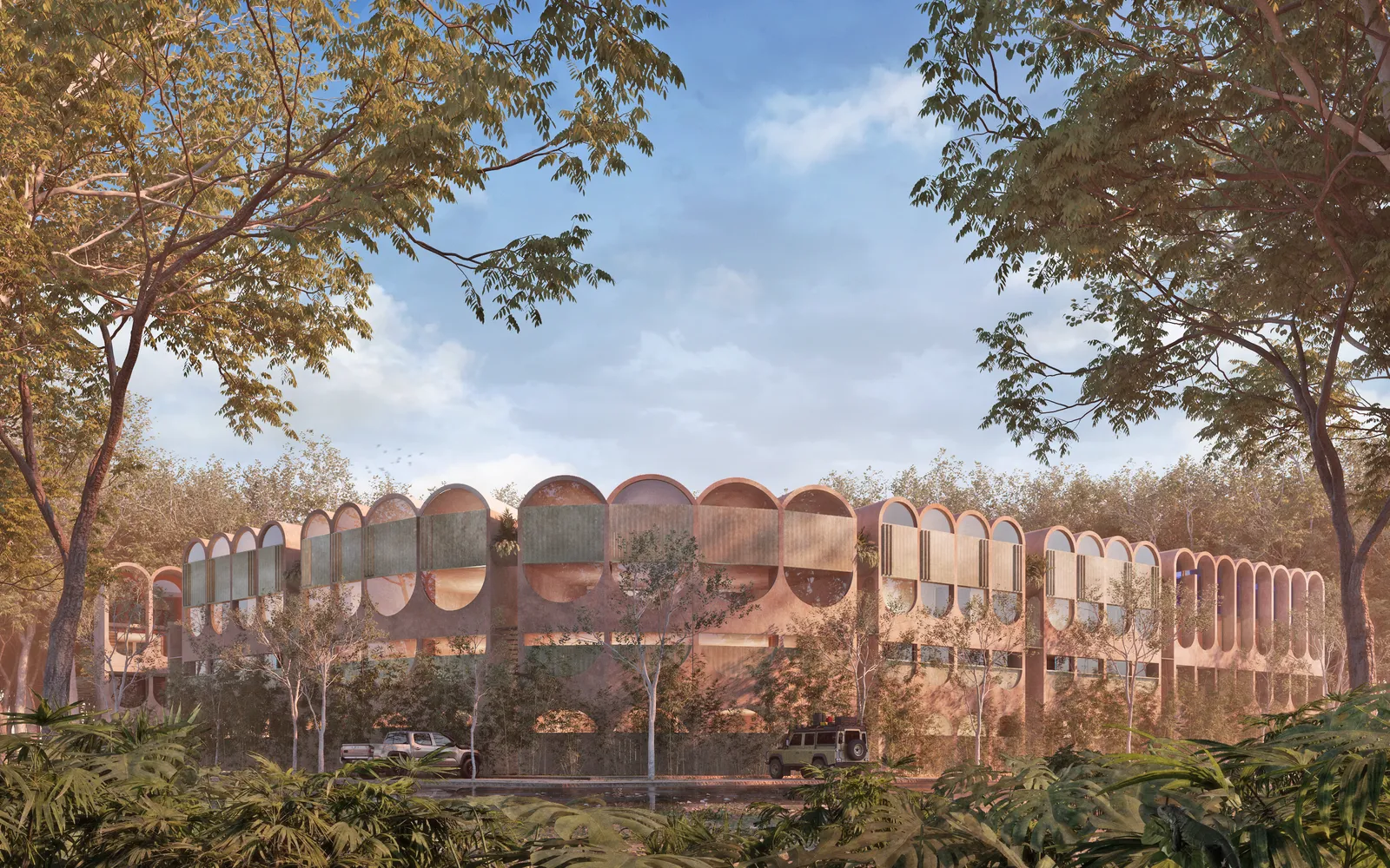 Modern building with arched windows surrounded by trees