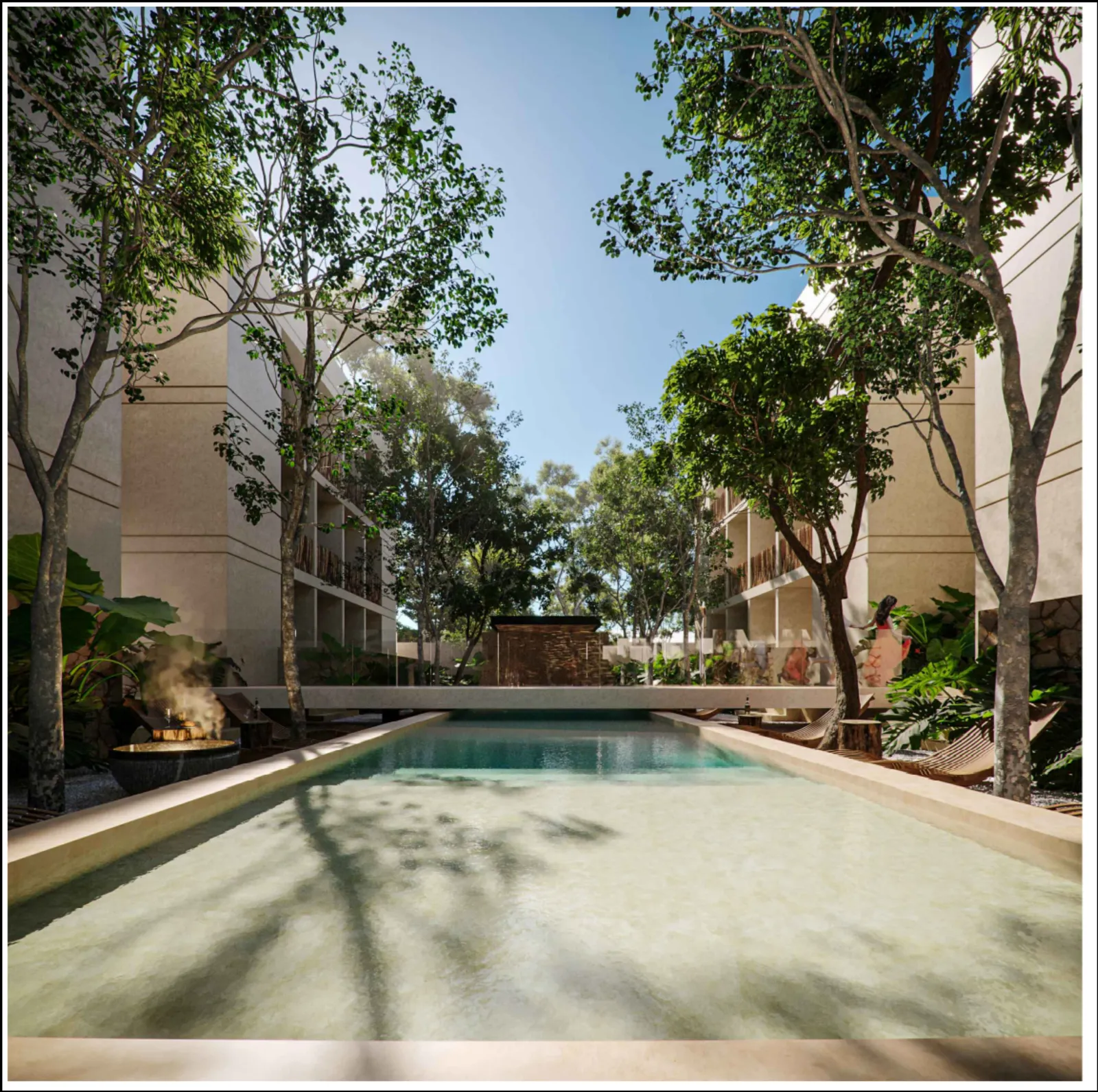 Modern swimming pool surrounded by trees and buildings