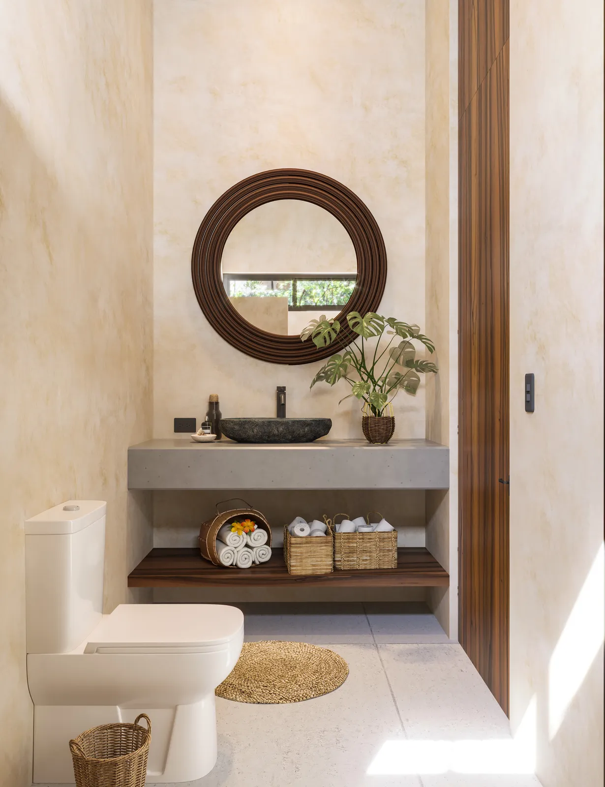 Modern bathroom with stone vessel sink and round mirror