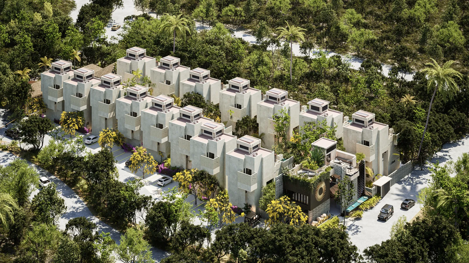 Aerial view of modern white villas surrounded by lush greenery
