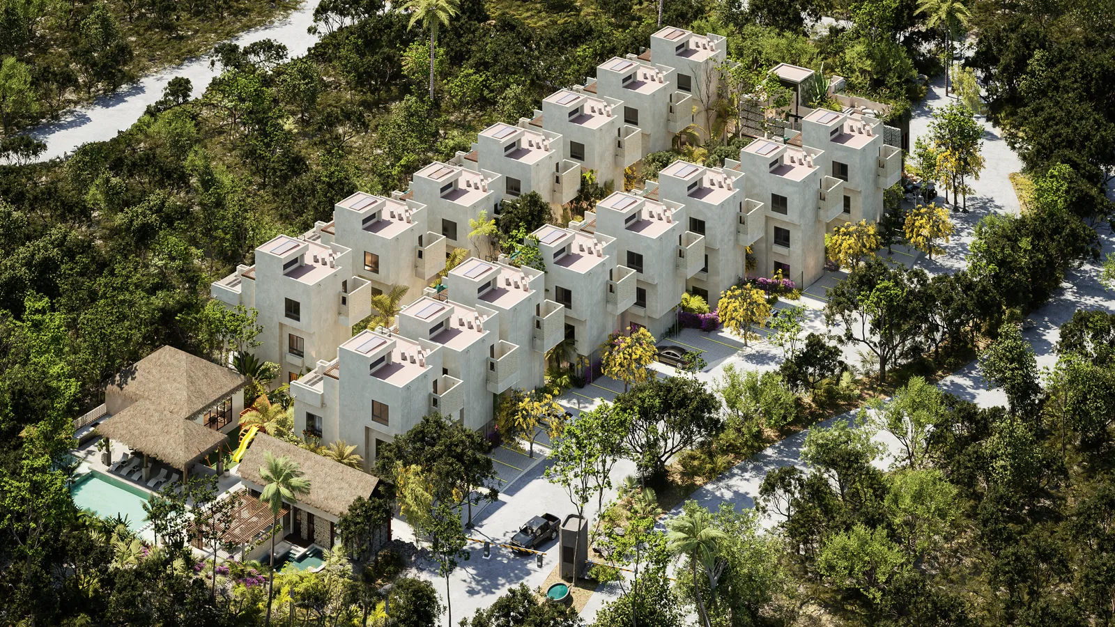 Aerial view of modern white residential complex with pool