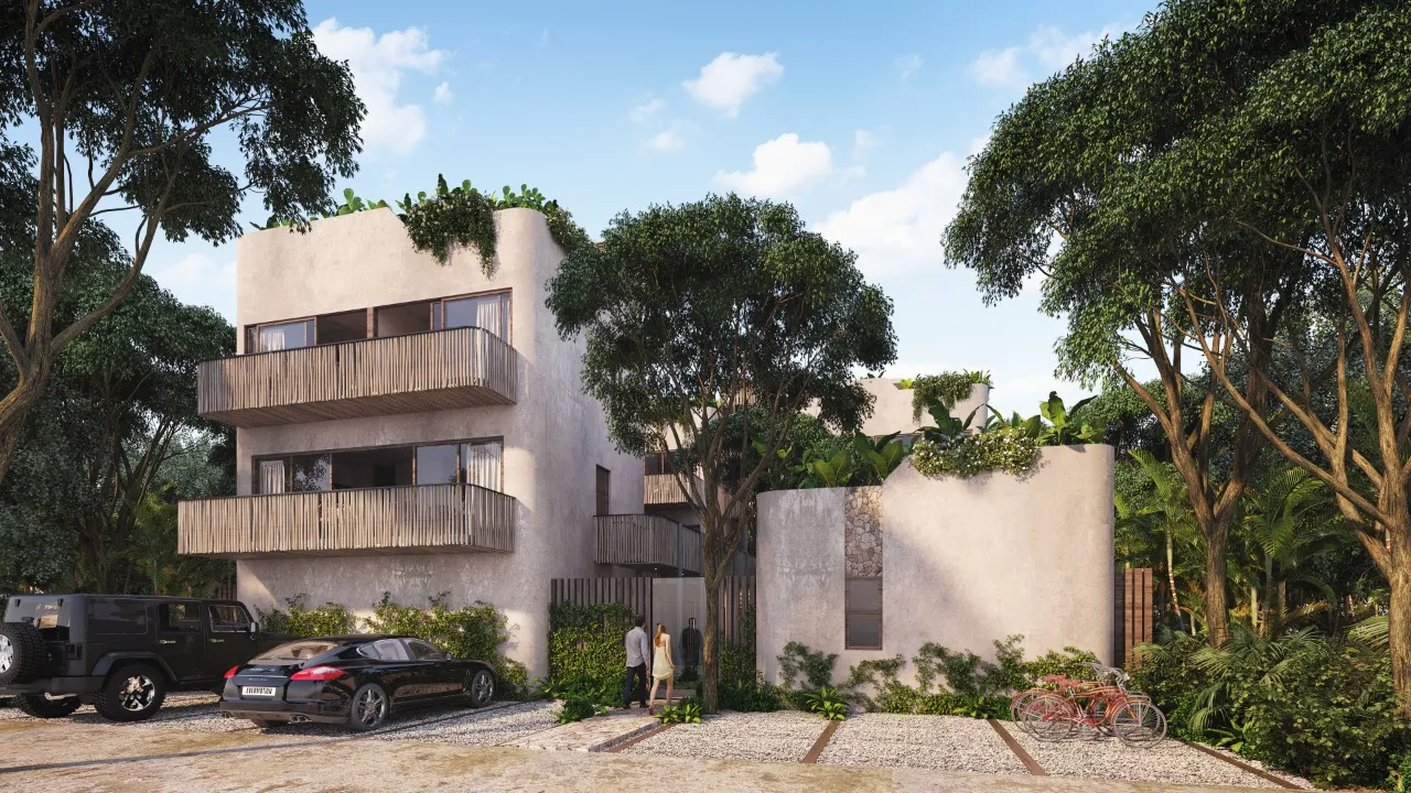 Modern building exterior with parked cars and trees