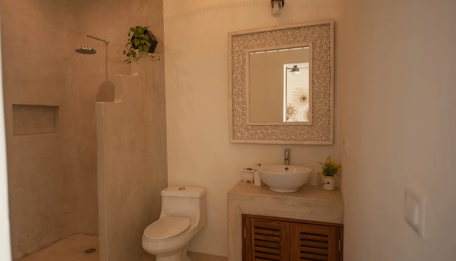 Finished bathroom interior with shower, toilet, and vanity