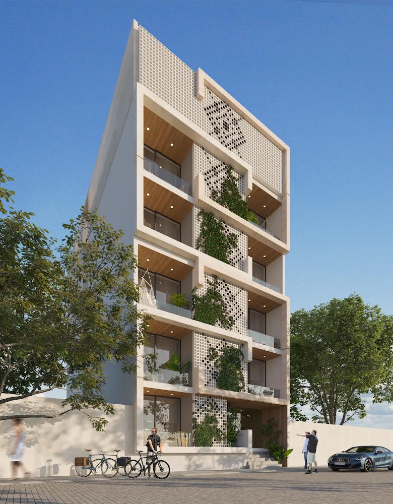 Modern multi-story building exterior with vertical gardens and balconies