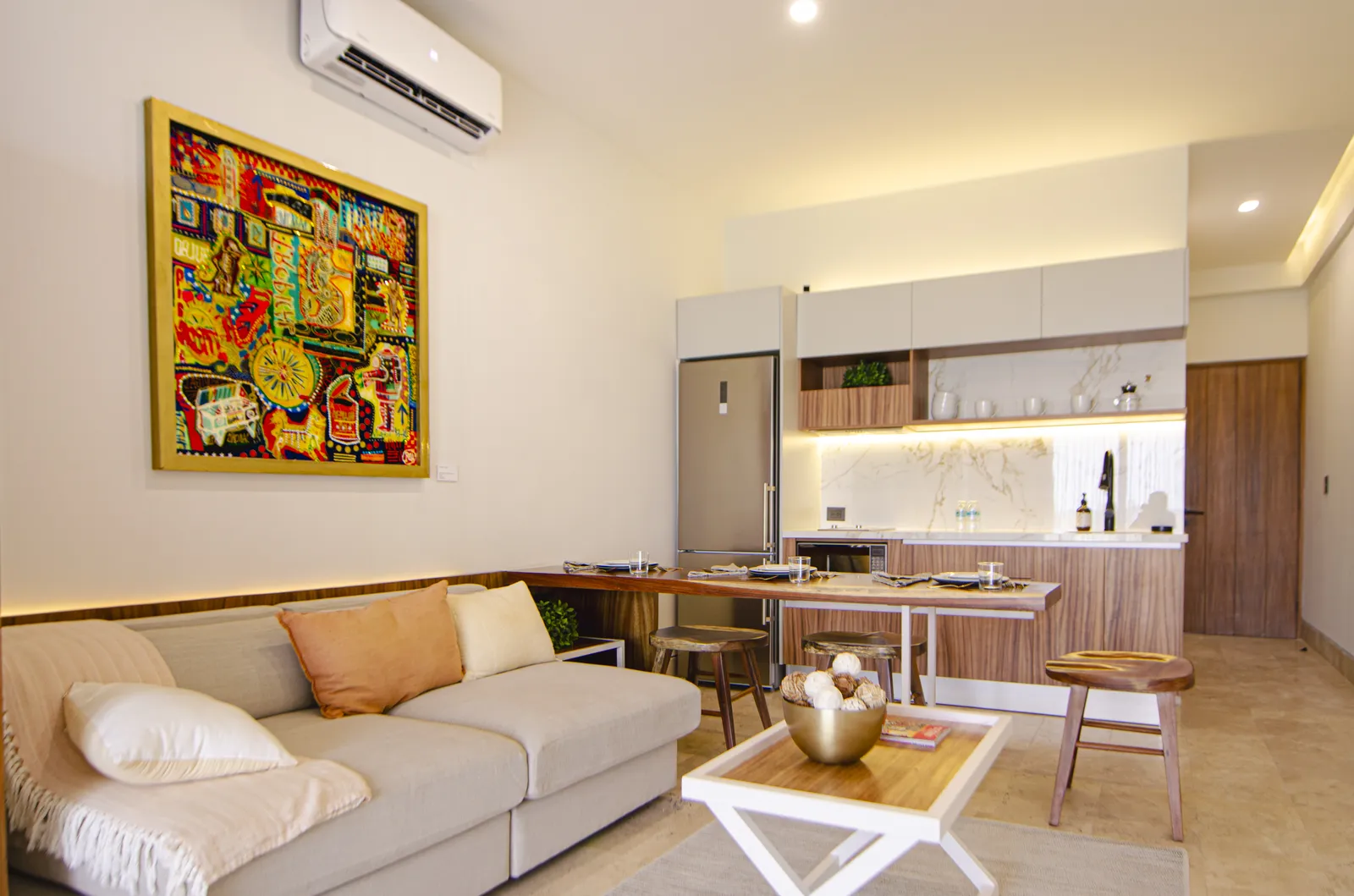 Modern furnished living room and kitchen area