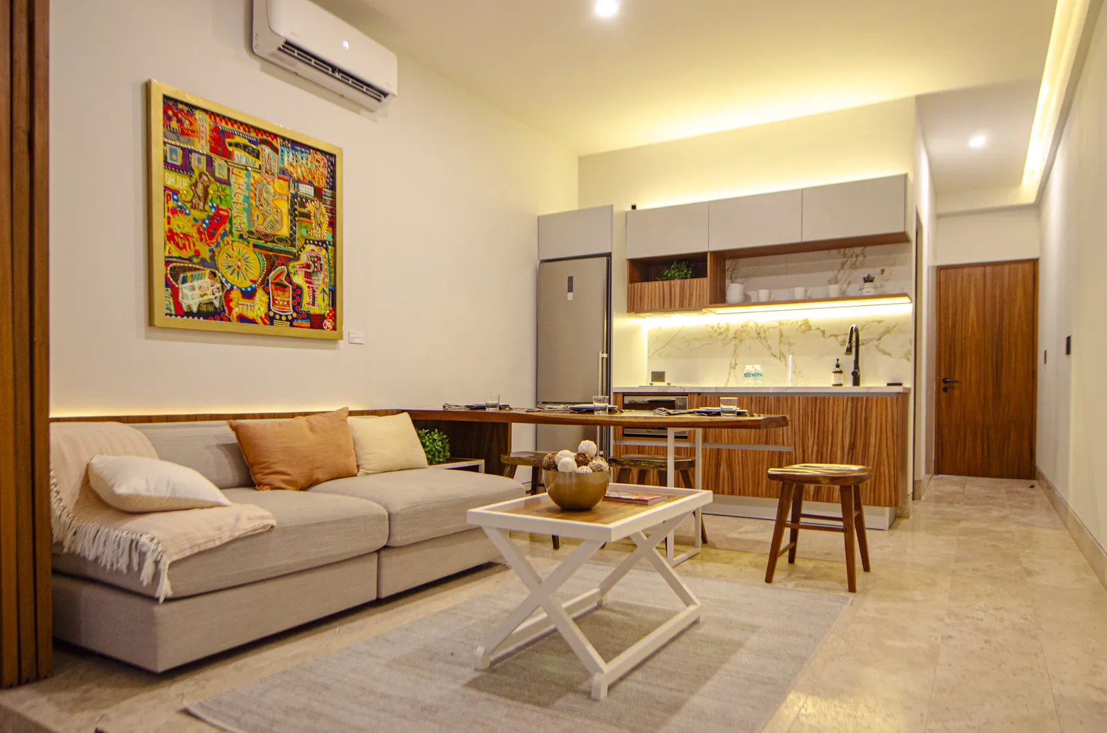Furnished living room and kitchen in a modern apartment