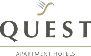 Quest Apartment Hotels logo with stylized bird above the word QUEST.