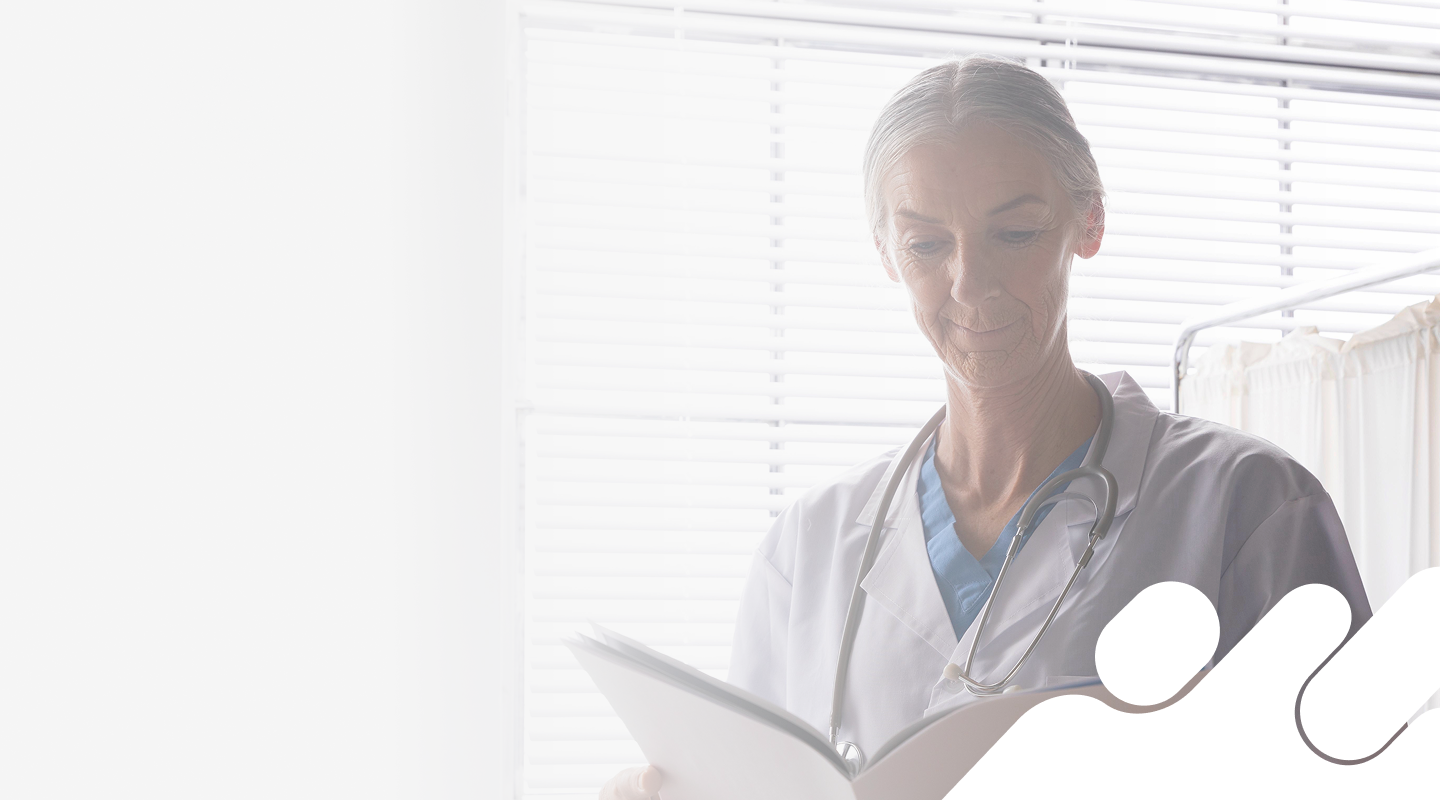Doctor is reading a patient's file