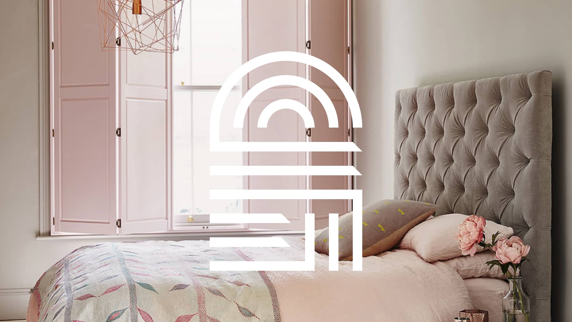 Cover image with Shutter Suffolk logo symbol over pink full-height shutters in a cosy bedroom.