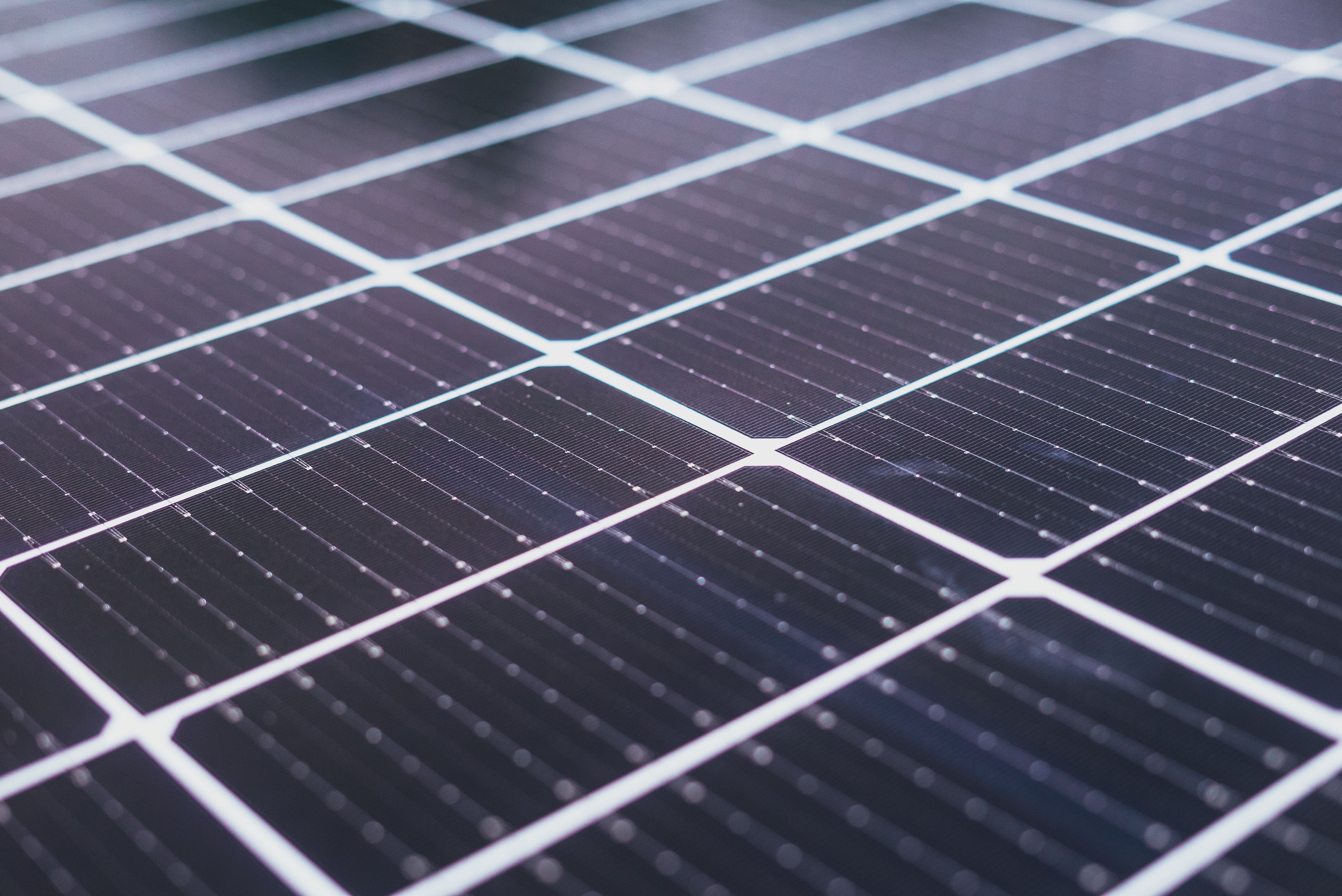 Close-up of solar panels on an Australian rooftop, illustrating how rebates and incentives shape the payback period for household solar systems.