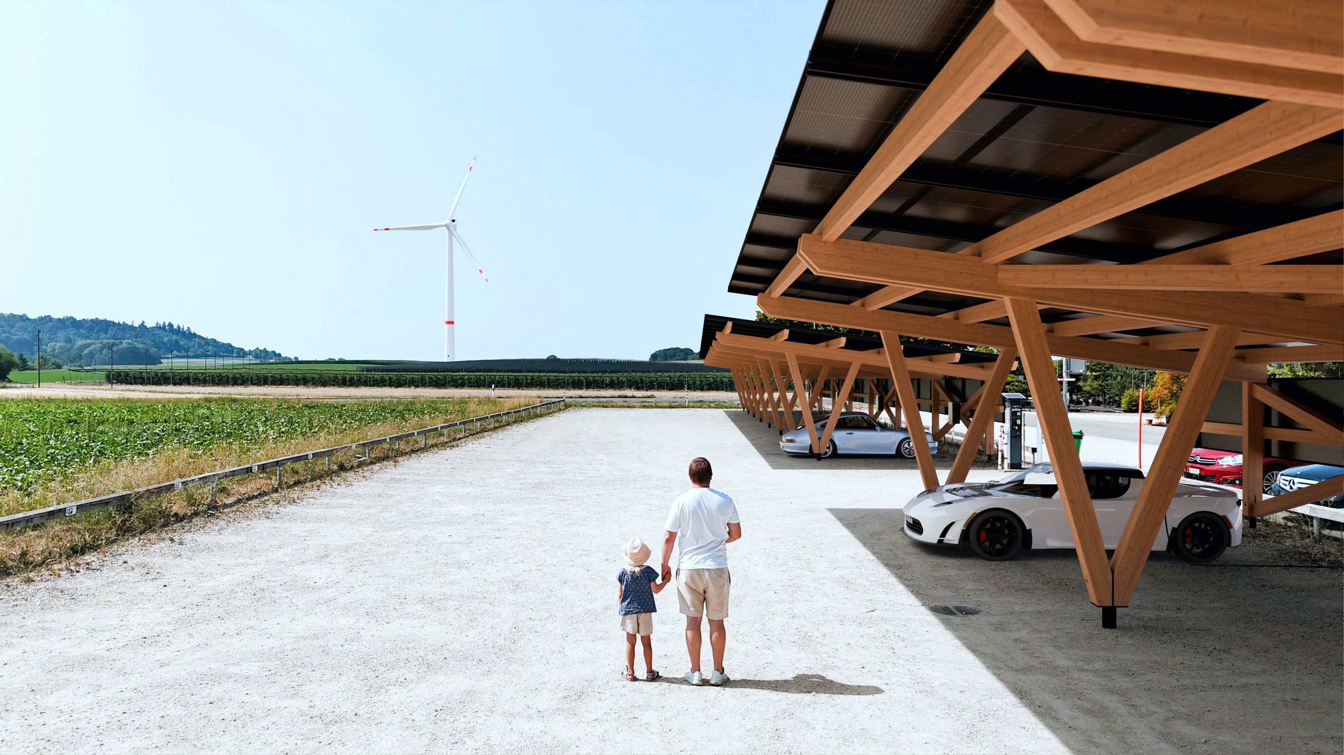 Samuel Schneider mit Tochter auf Parkplatz. Rechts Solar Carport aus Holz mit Tesla Roadster und elektrischem 911er geparkt am Ladepunkt. Im Hintergrund eine Wirndturbine.