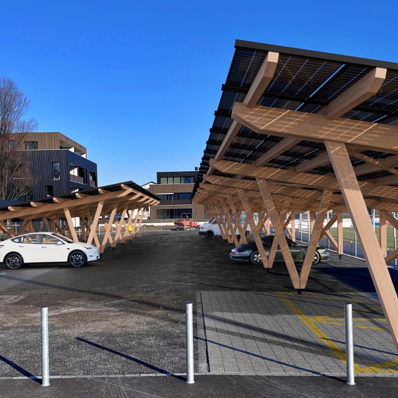 A wooden solar carport in Switzerland near a Sports Centre in Eastern Switzerland