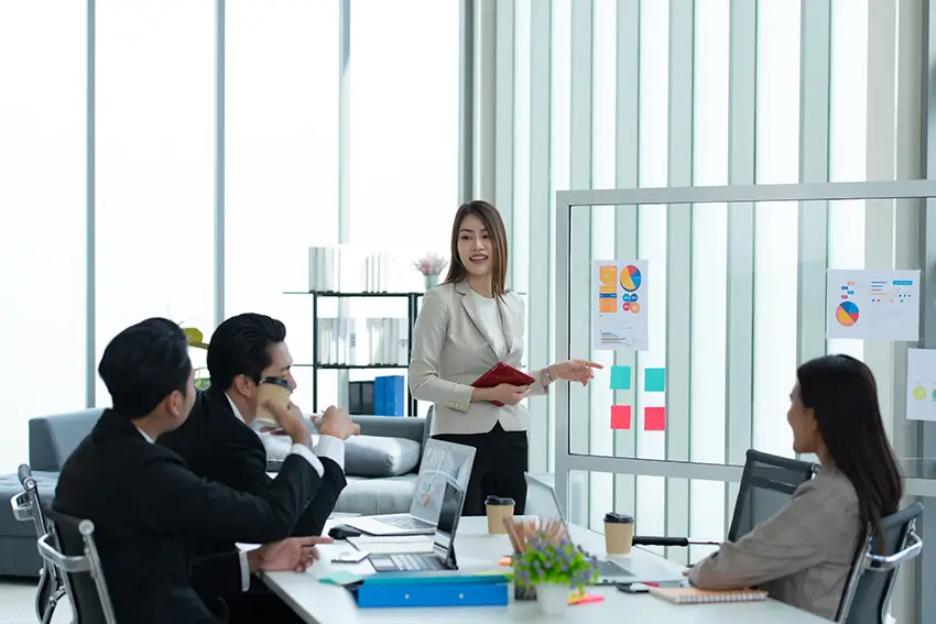 People sat speaking at a Neuroleadership meeting