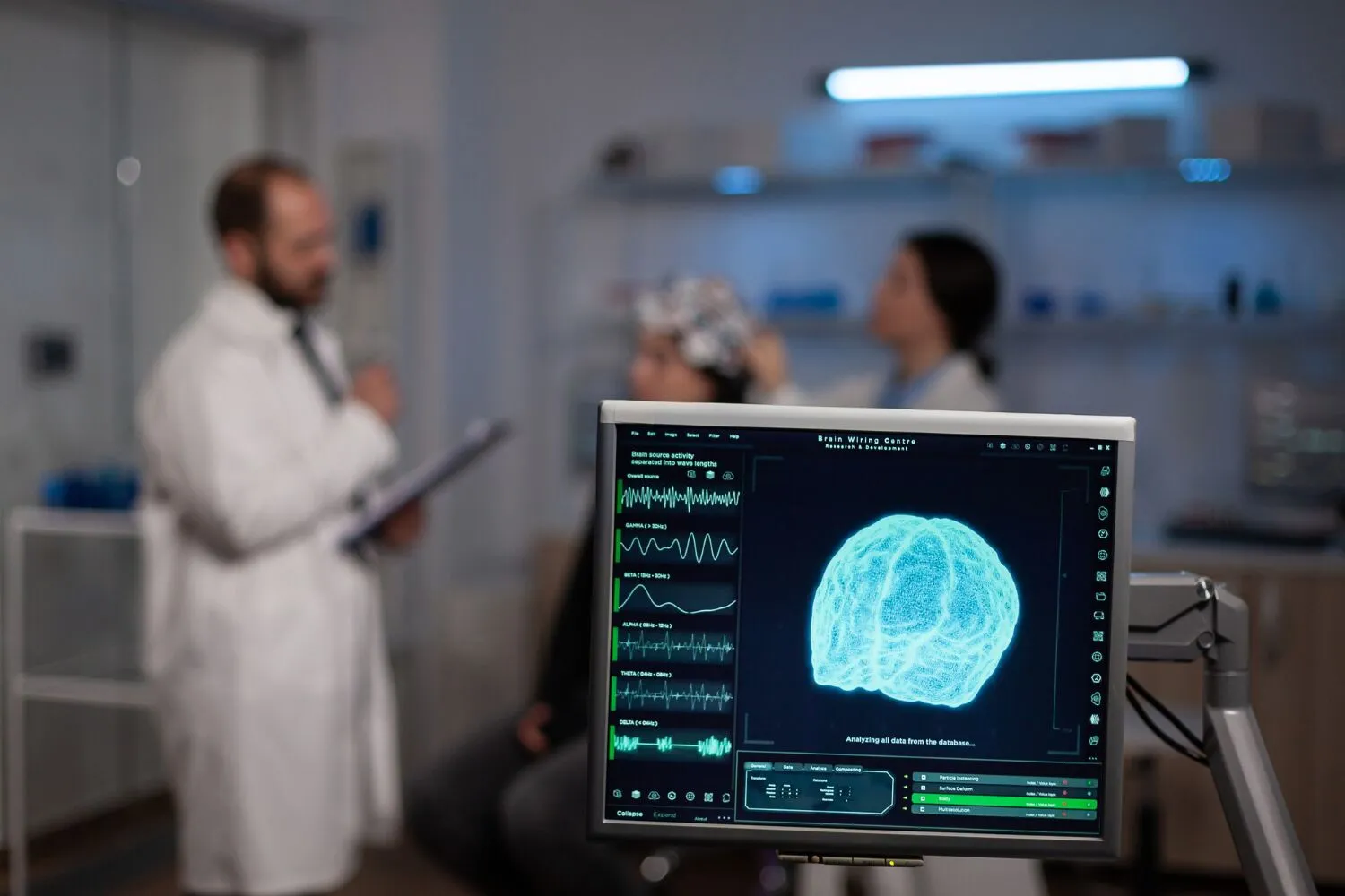 Image of a laboratory with a computer screen showing a brain