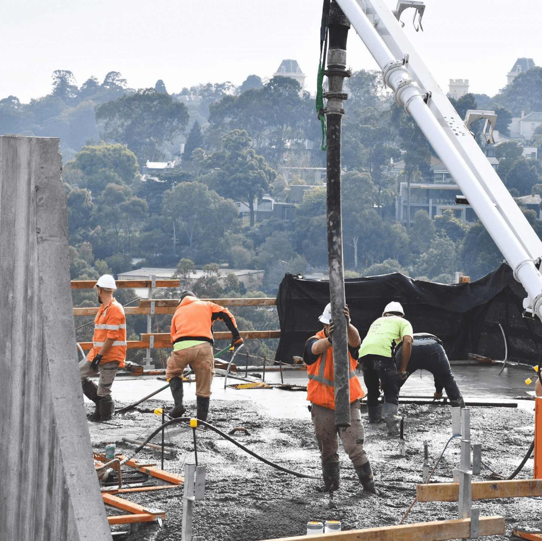 [background image] image of construction team meeting in a construction site