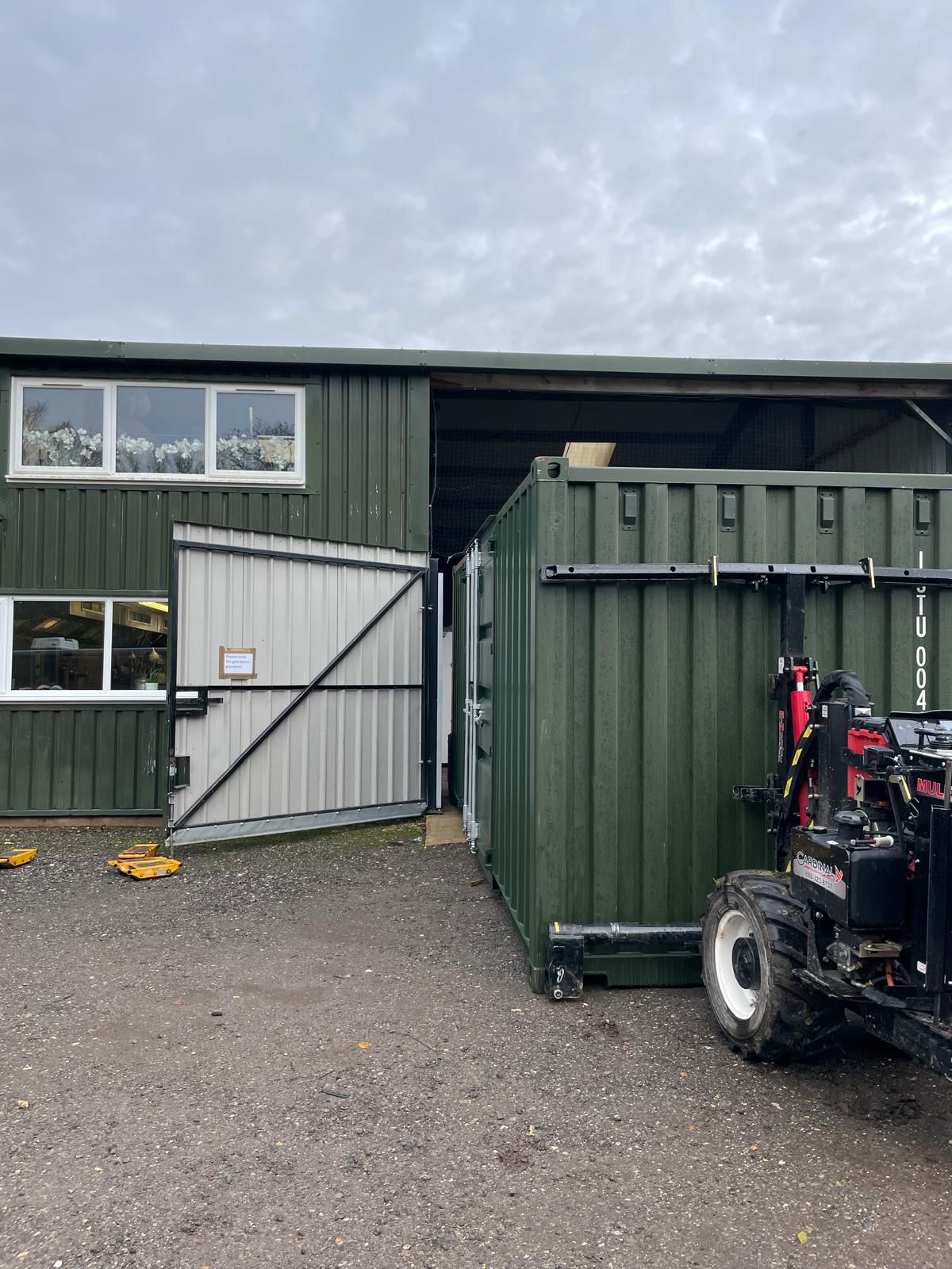 Container Site near railway track and tunnels