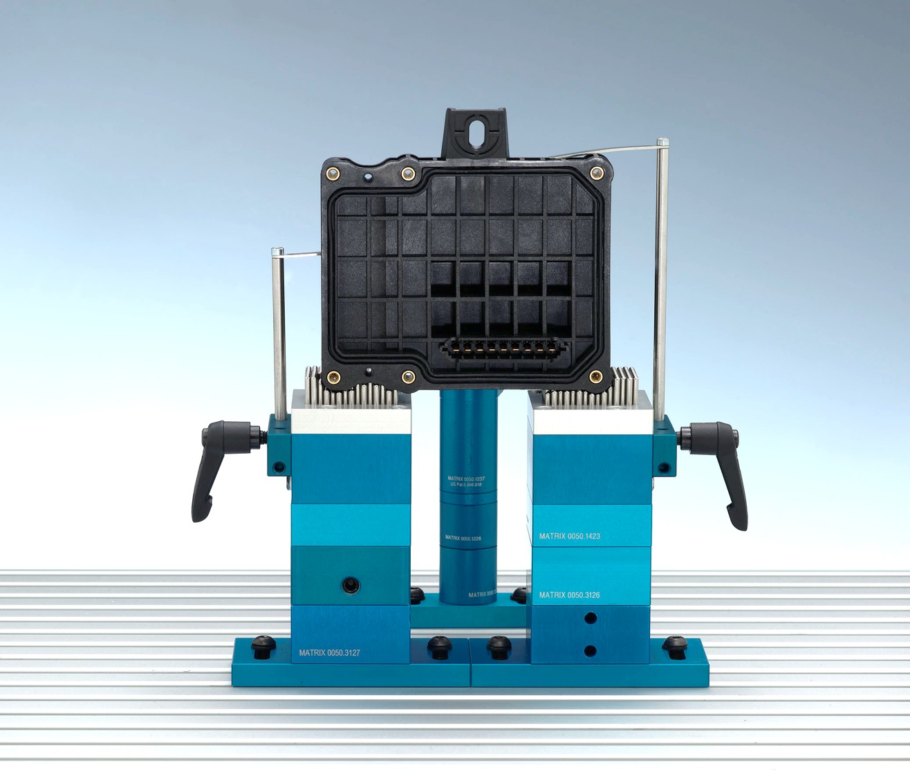 Plastic Part in Matrix Blue Clamp