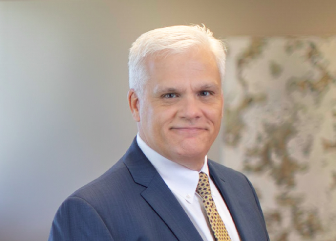 Mark E. Young
