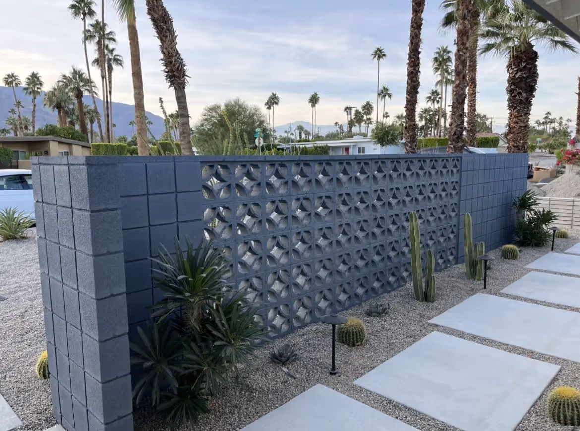A cement wall painted blue for a home in Yorba Linda, CA.