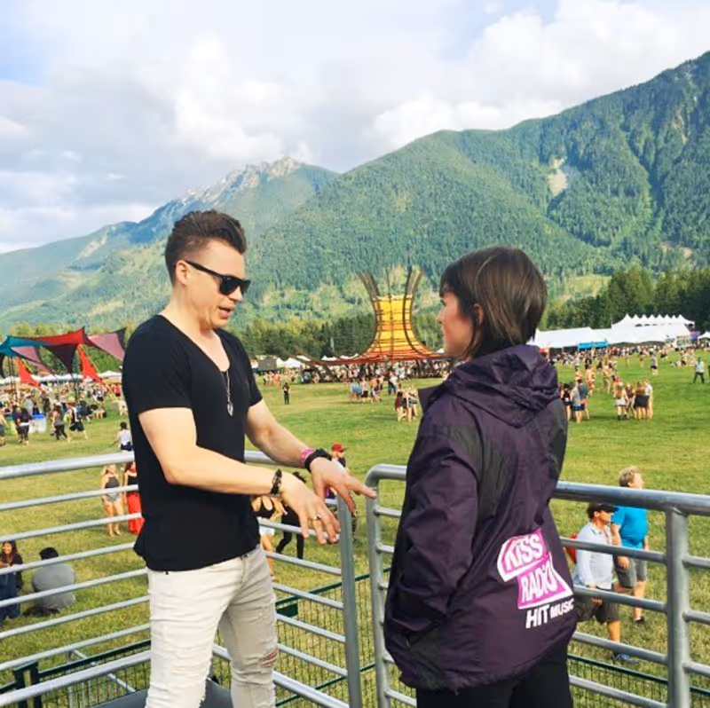 Devyn performing a radio interview at Pemberton Music festival.