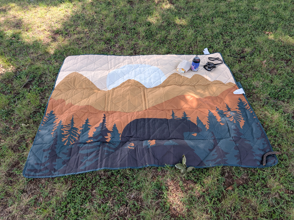 picnic blanket on grass