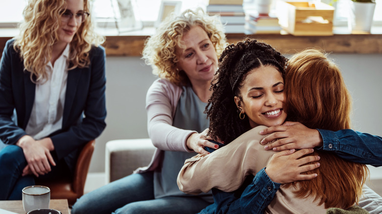 women hugging