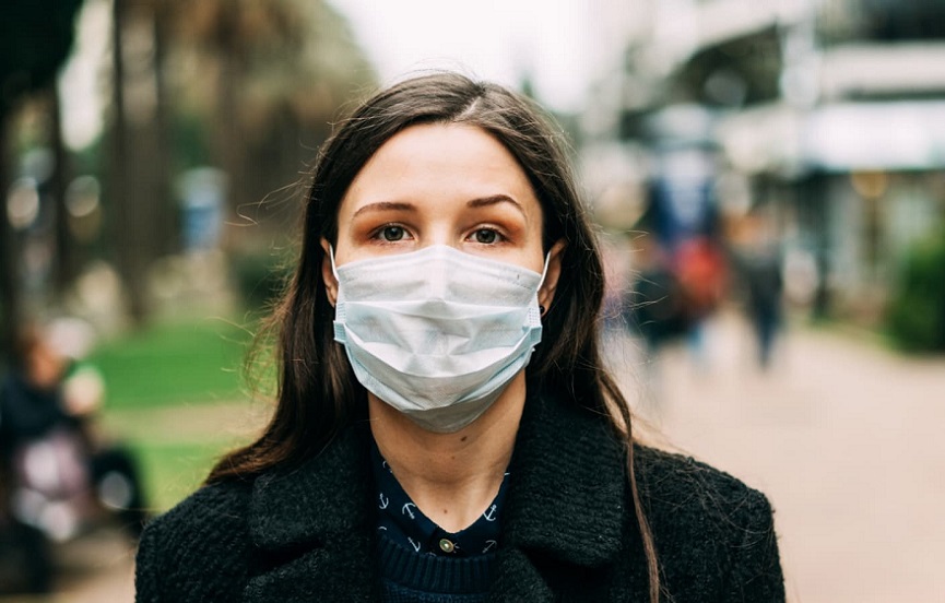image of a woman wearing a mask