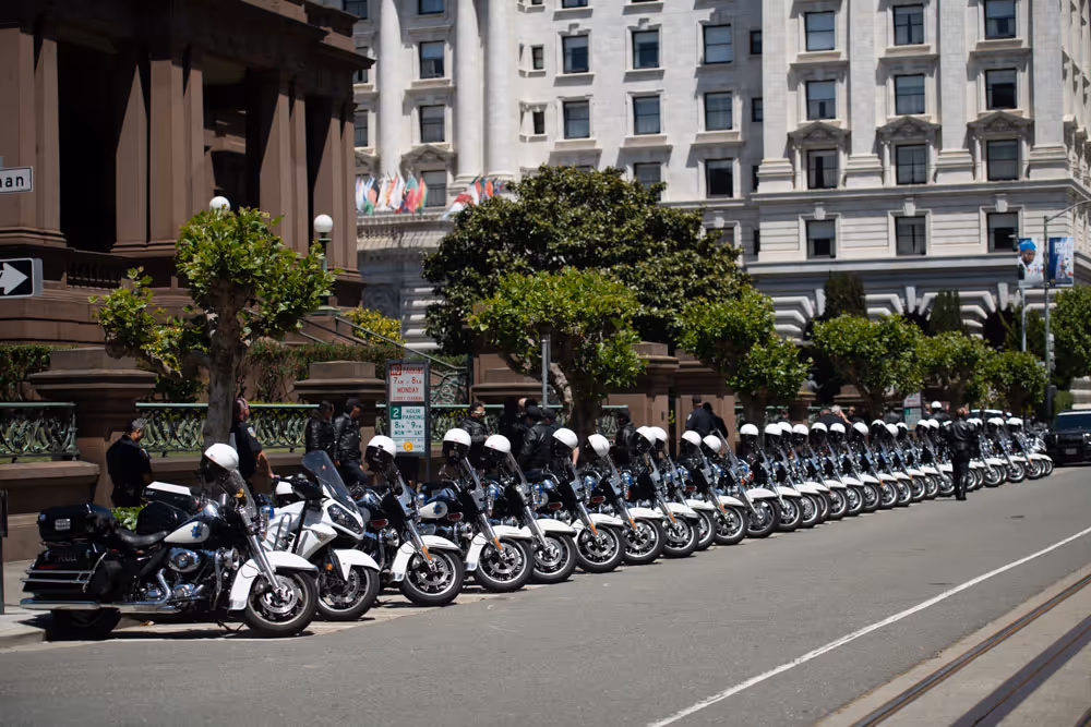 police motorcycles lined up on the street