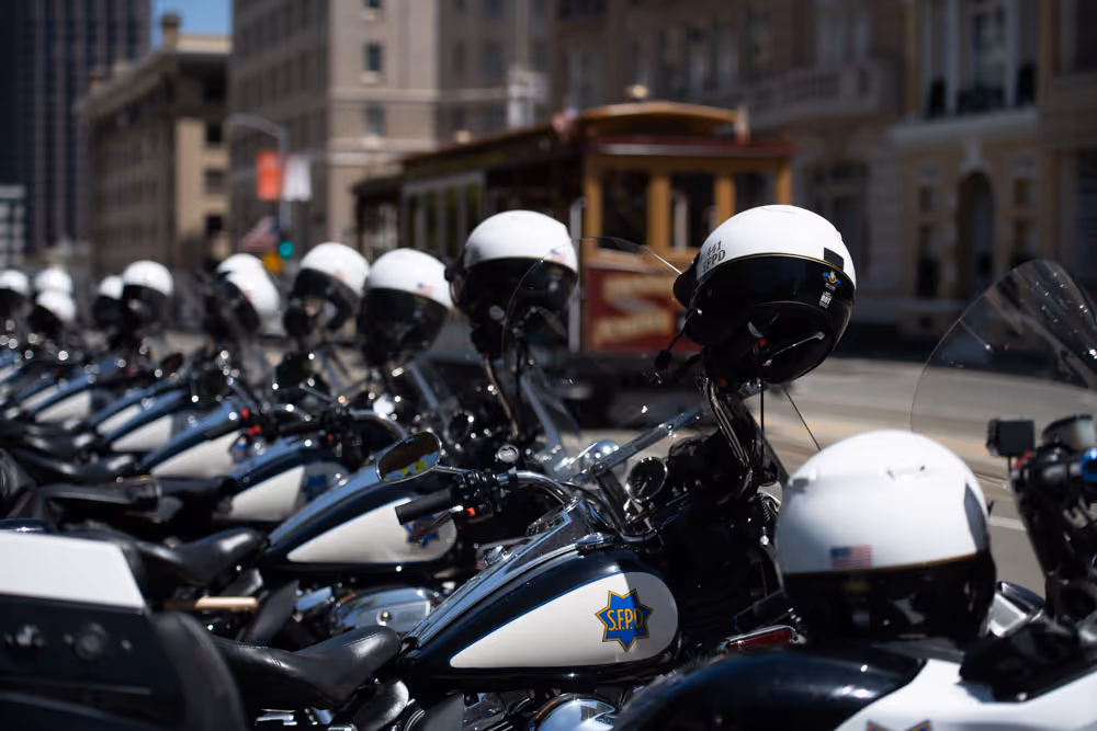 Police motorcycles lined up on the street