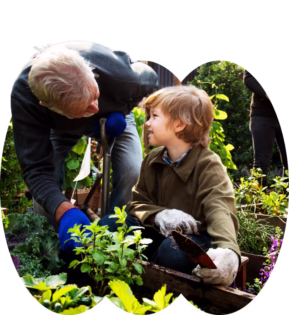 A man with his grand children gardening