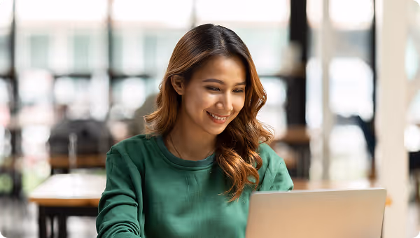 women smiling and working