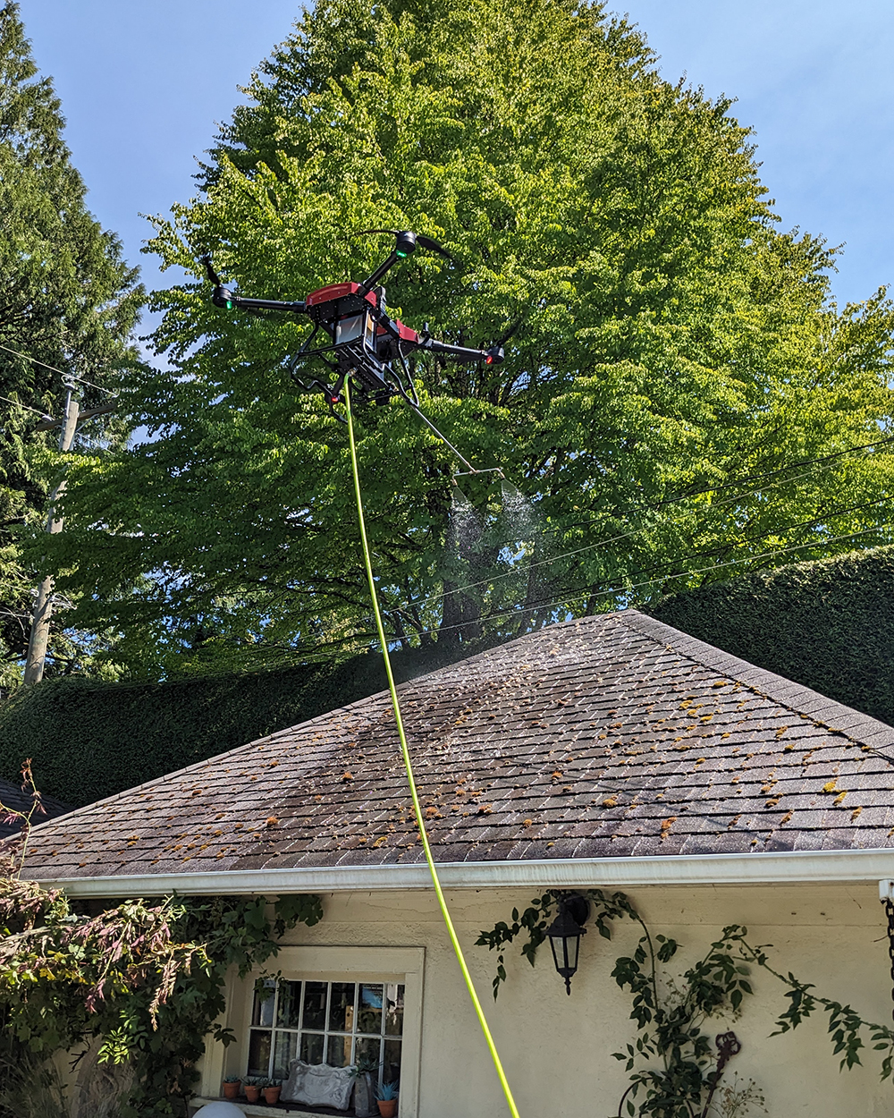 StratosClear using a cleaning drone to softwash a roof in Vancouver, BC