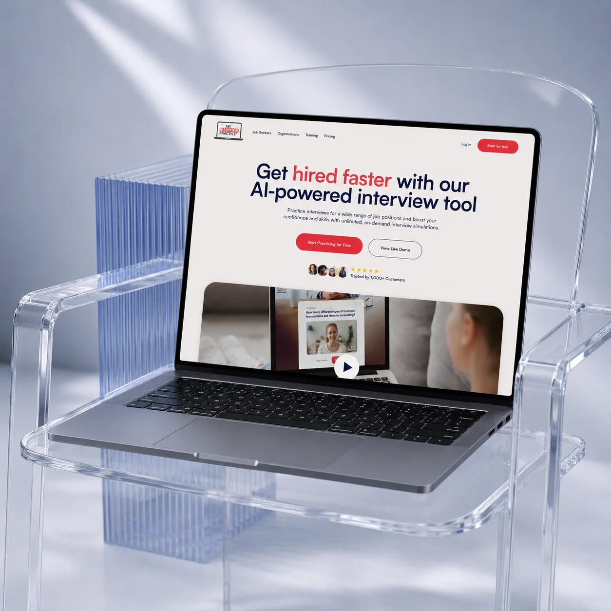 Laptop on clear acrylic chair showing AI-powered interview tool website for faster hiring.