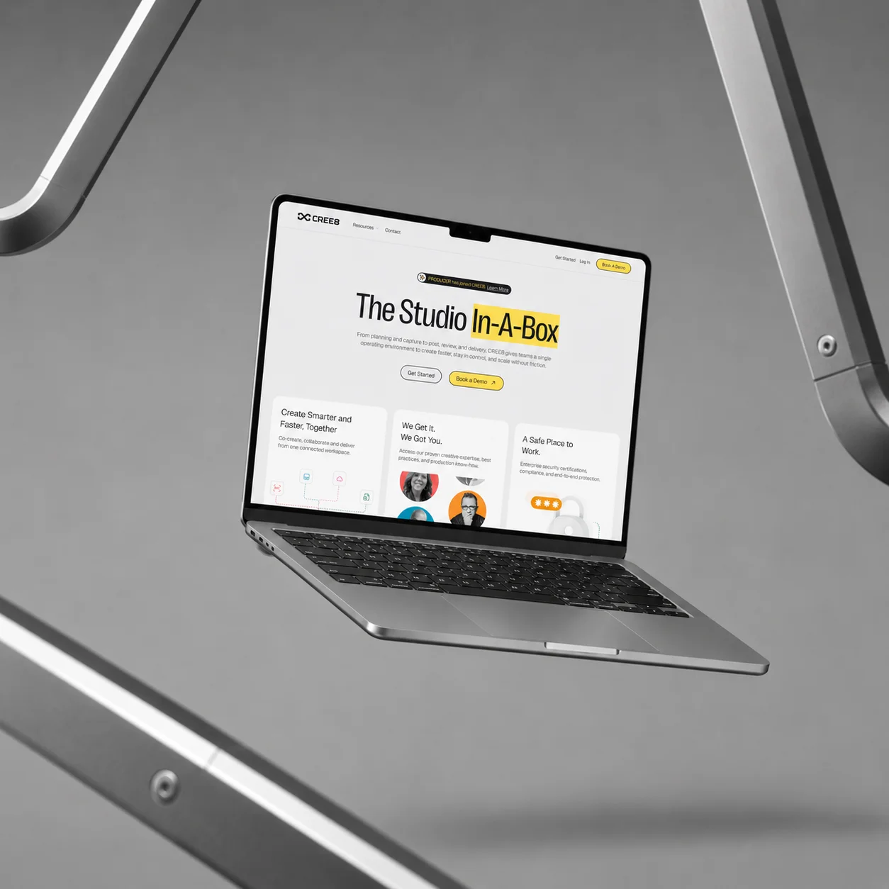 Open laptop showing CREE8 website homepage titled The Studio In-A-Box with call-to-action buttons.