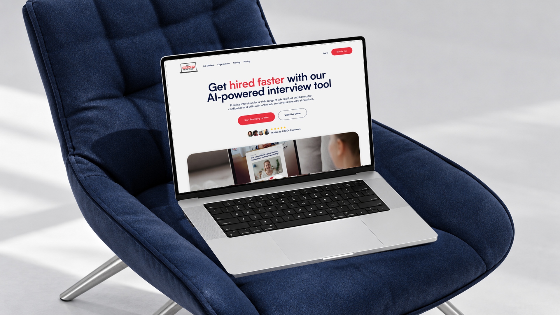 Laptop on clear acrylic chair shows 'Your Interview is Ready' screen for video practice with AI feedback.