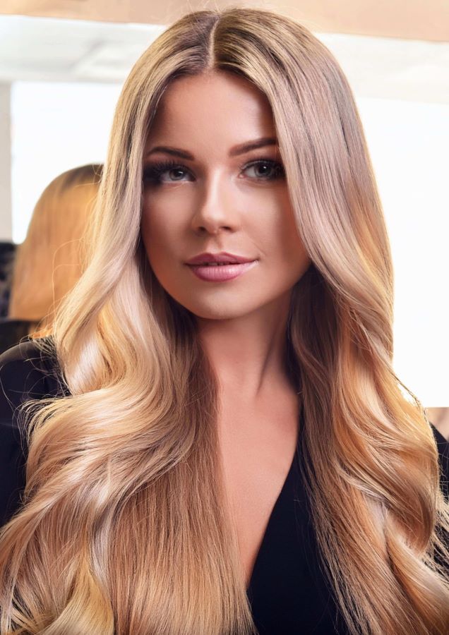 A blond young woman with beautiful hair