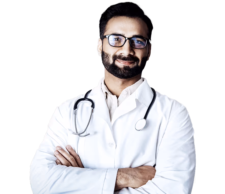 Male doctor with beard and glasses wearing a white coat and stethoscope, arms crossed and smiling.