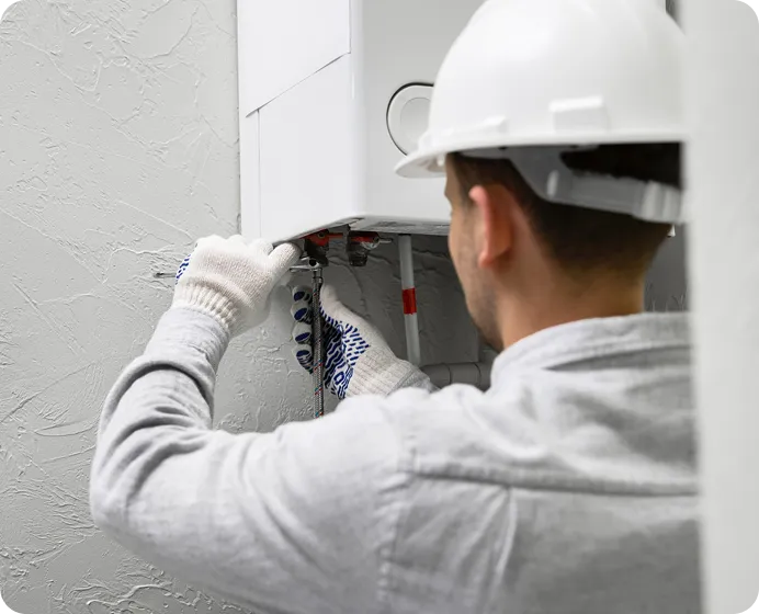 A man fixing water system